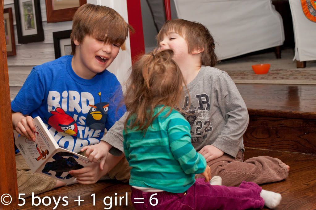 Family Time: Patrick reading to his brother and sister