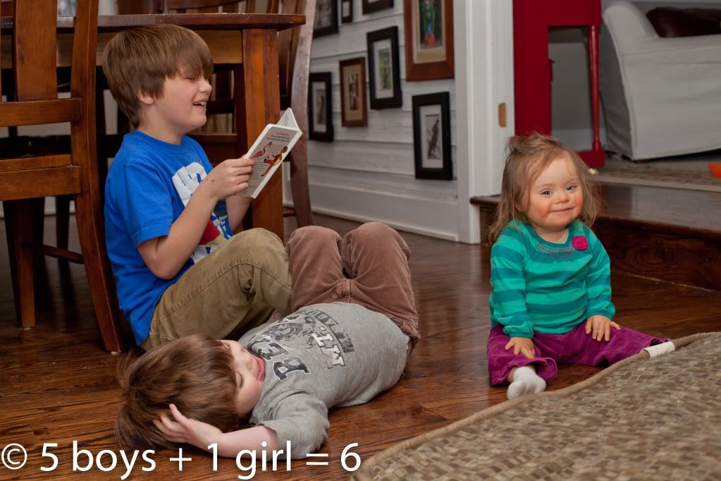 Family Time: Patrick reading to his brother and sister