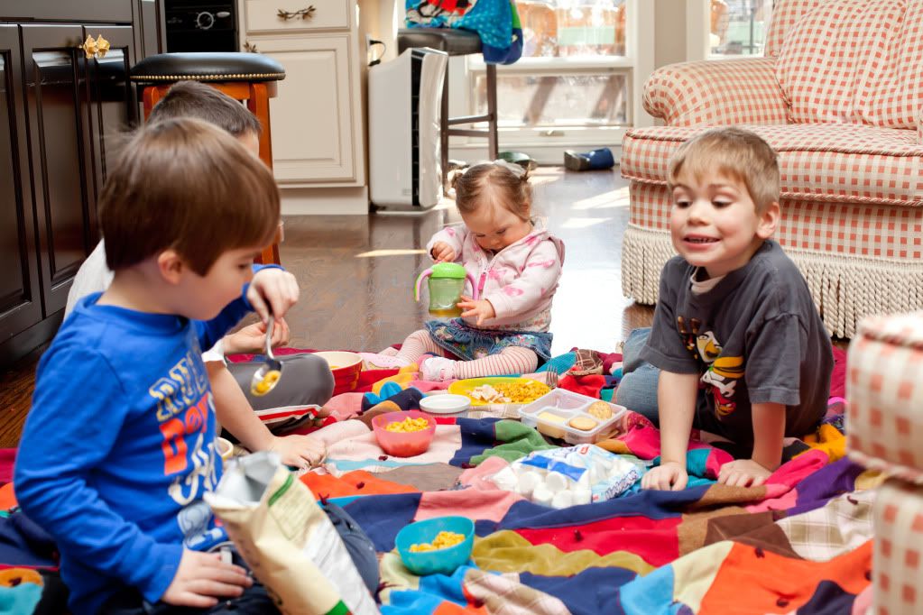 Family time: lunch on the floor for an indoor picnic