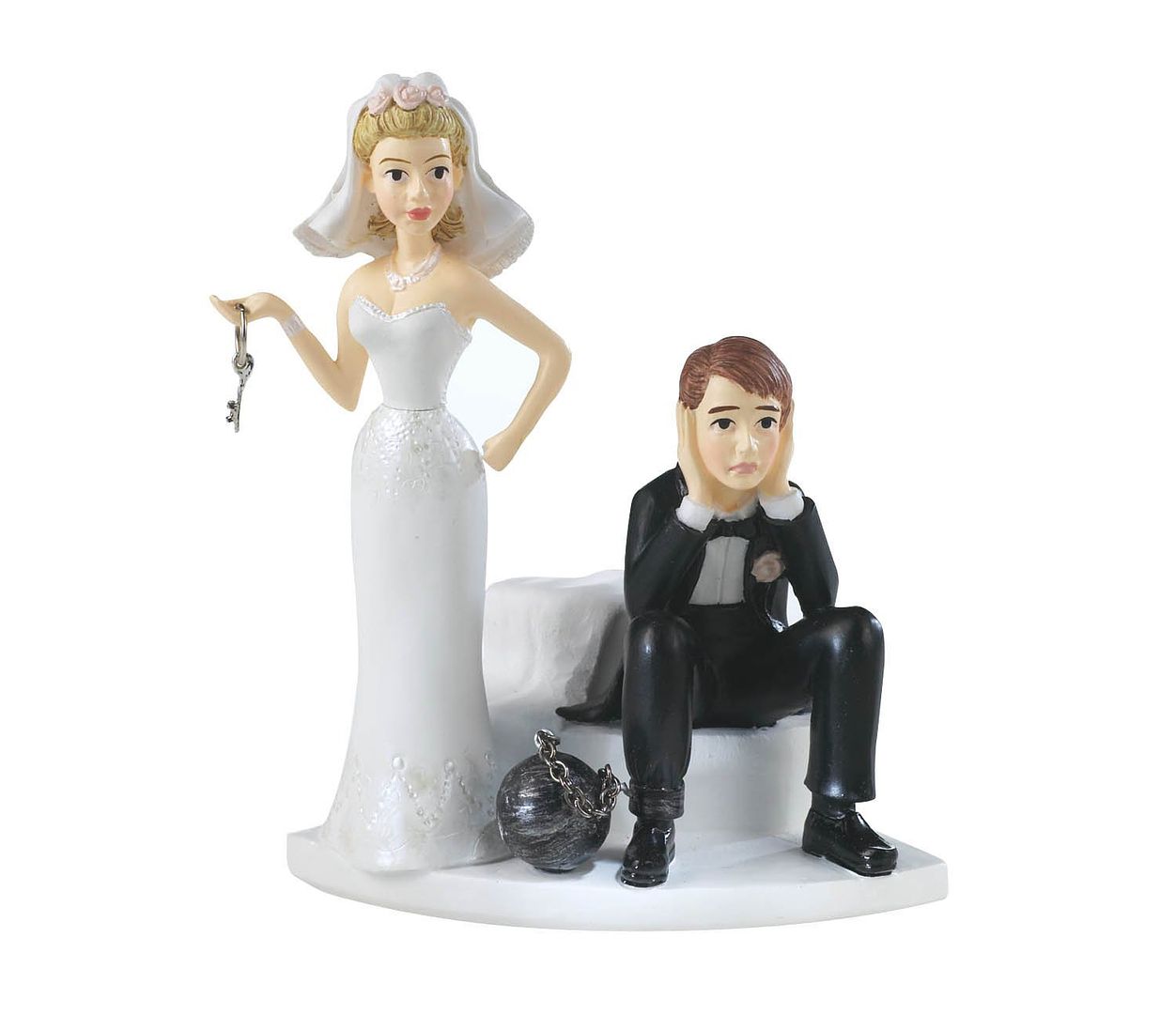 a groom sitting and wife holding a key cake topper