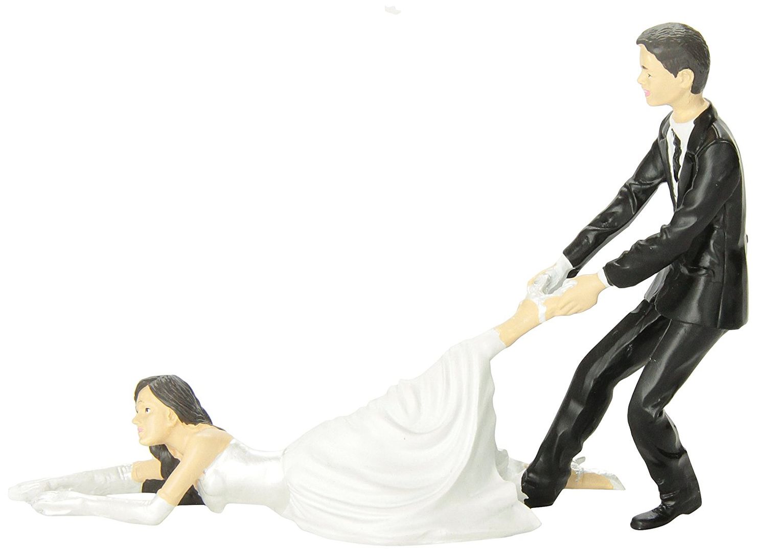 bride wearing a dress and groom cake topper