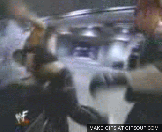 Dwayne Johnson gif photo: The Undertaker  Attacks The Rock prt 1 TheUndertakerAttacksTheRockPrt1.gif