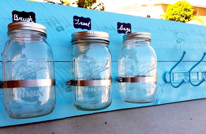 Keep all of your pup's essentials organized in style with this easy DIY mason jar dog treat organizer! Check out the video tutorial too!